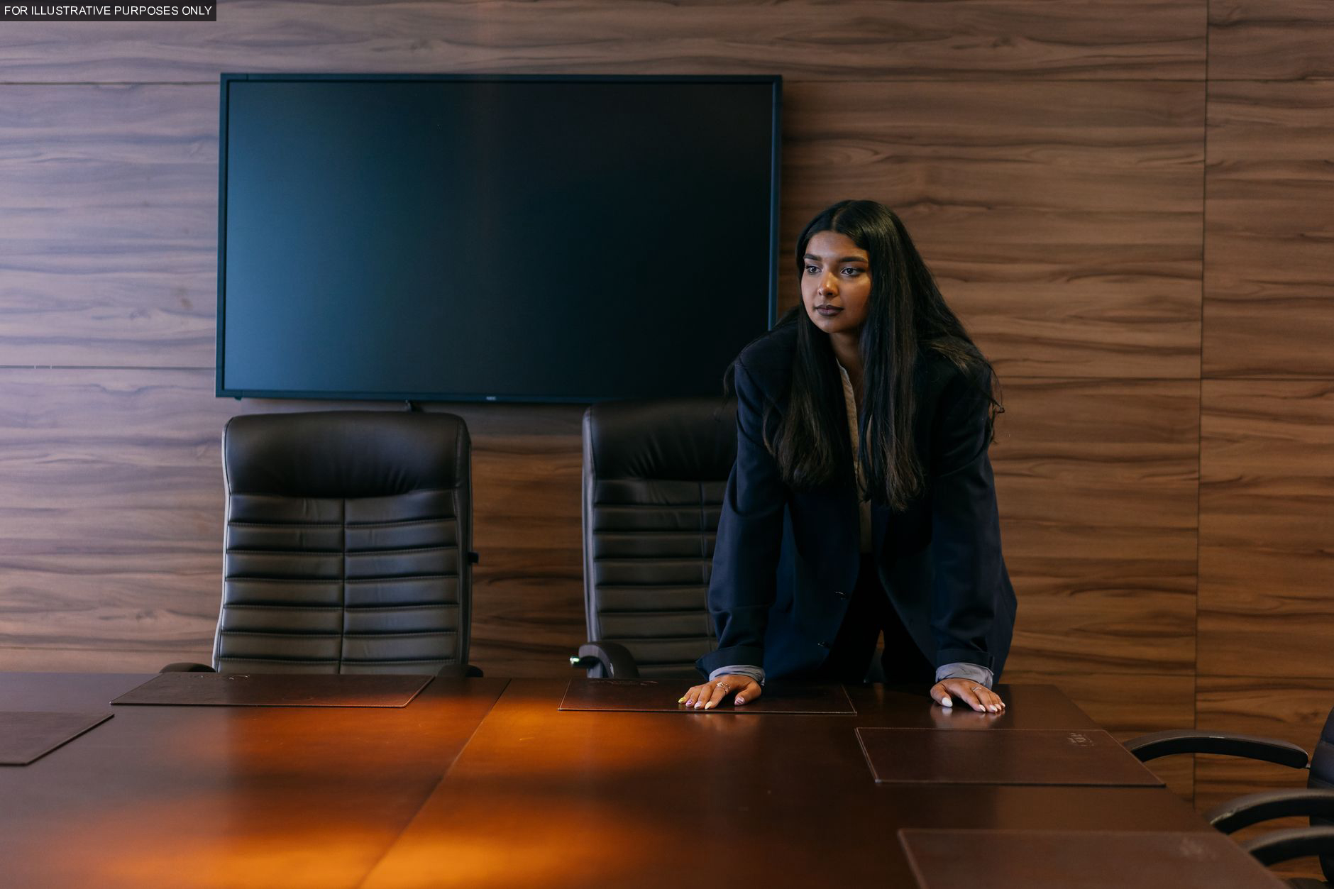 My regional sales director stood up at the quarterly all-hands and credited a junior colleague with the campaign I had built from scratch over eight months — I did not correct her in that room, because the client contract bore my signature and the pitch deck metadata bore my name on every single revision.